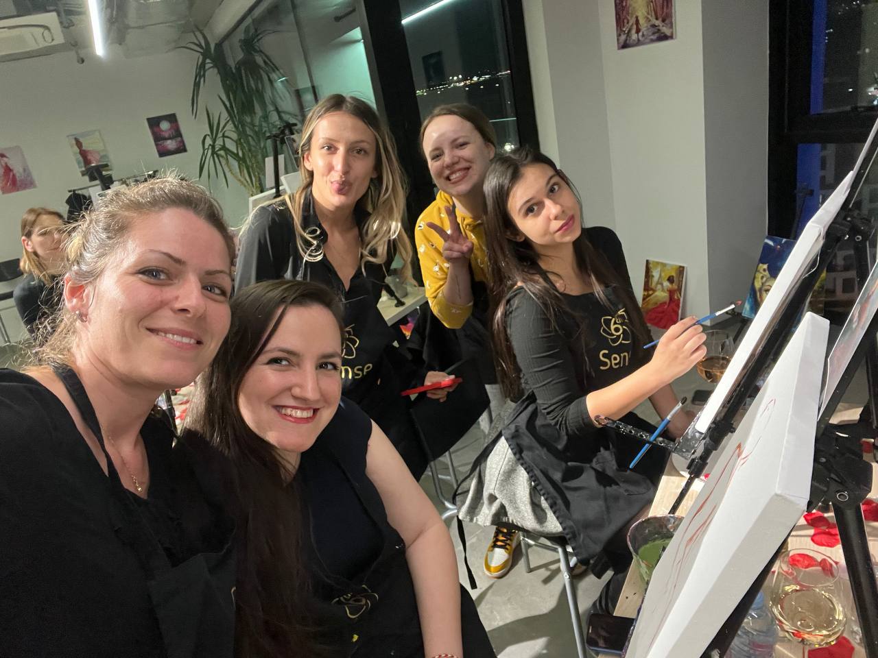 The ladies focused on their canvases