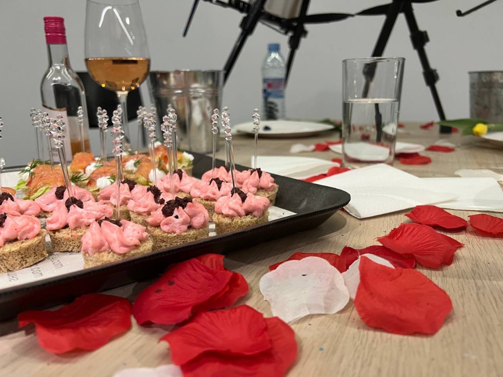 The sophisticated setup with wine and appetizers